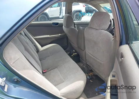 2003 Toyota Camry Le z USA, uszkodzony, nr VIN 4T1BE32K73U677632